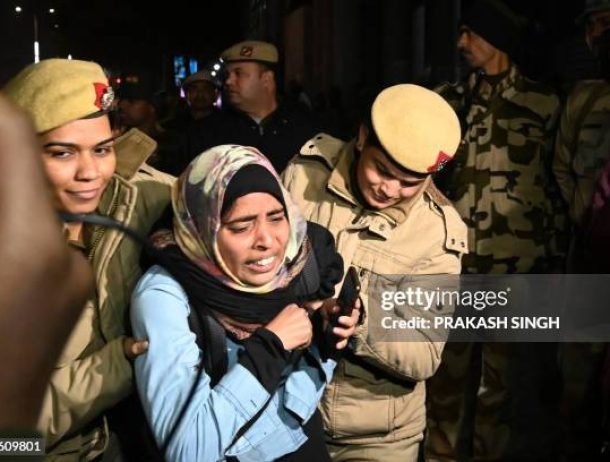 Police detain a woman during a protest outside the police headquarters in New Delhi on January 30, 2020, to demand the police strict actions with a suspected Hindu nationalist who opened fire to demonstrators during a protest against the government's Citizenship Amendment Bill (CAB) outside Jamia Millia Islamia University. - One student was reportedly shot in the hand before police arrested the alleged gunman, who timed his attack to coincide with the anniversary of the assassination of independence hero Mahatma Gandhi in 1948 by a Hindu radical. (Photo by Prakash SINGH / AFP) (Photo by PRAKASH SINGH/AFP via Getty Images)